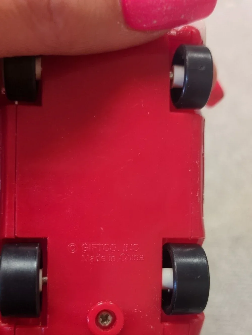 Red Wind-Up Kids Toy Car with Nail Clippers